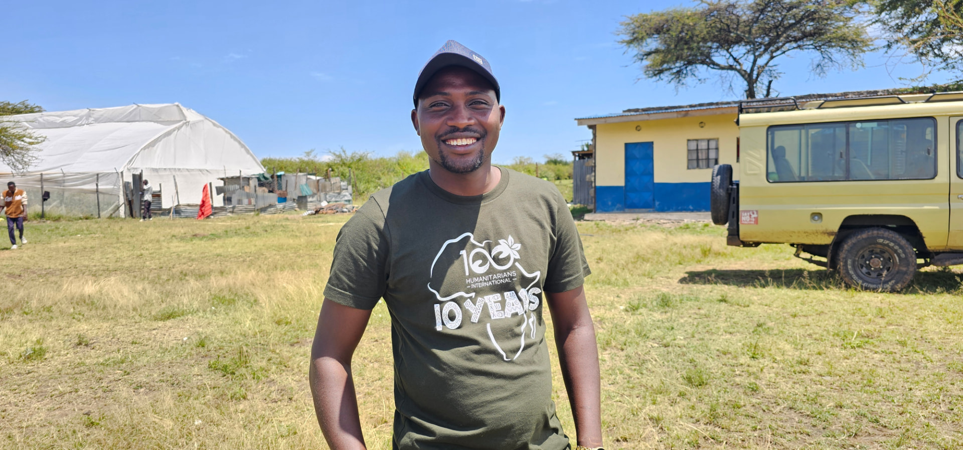 Fred Njapit in his green 100 Humanitarians shirt