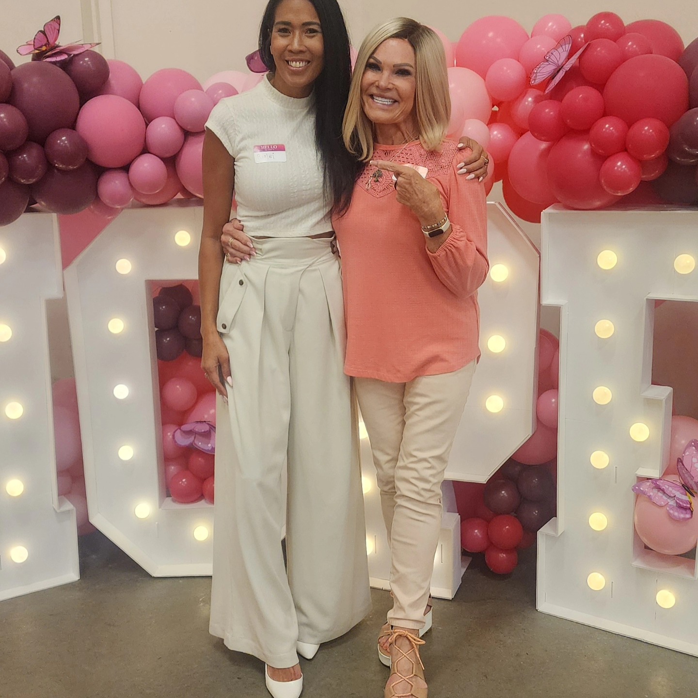 Mary Crafts and Pualei Lynn, founders of 100 Women of Hope, celebrating with pink balloons
