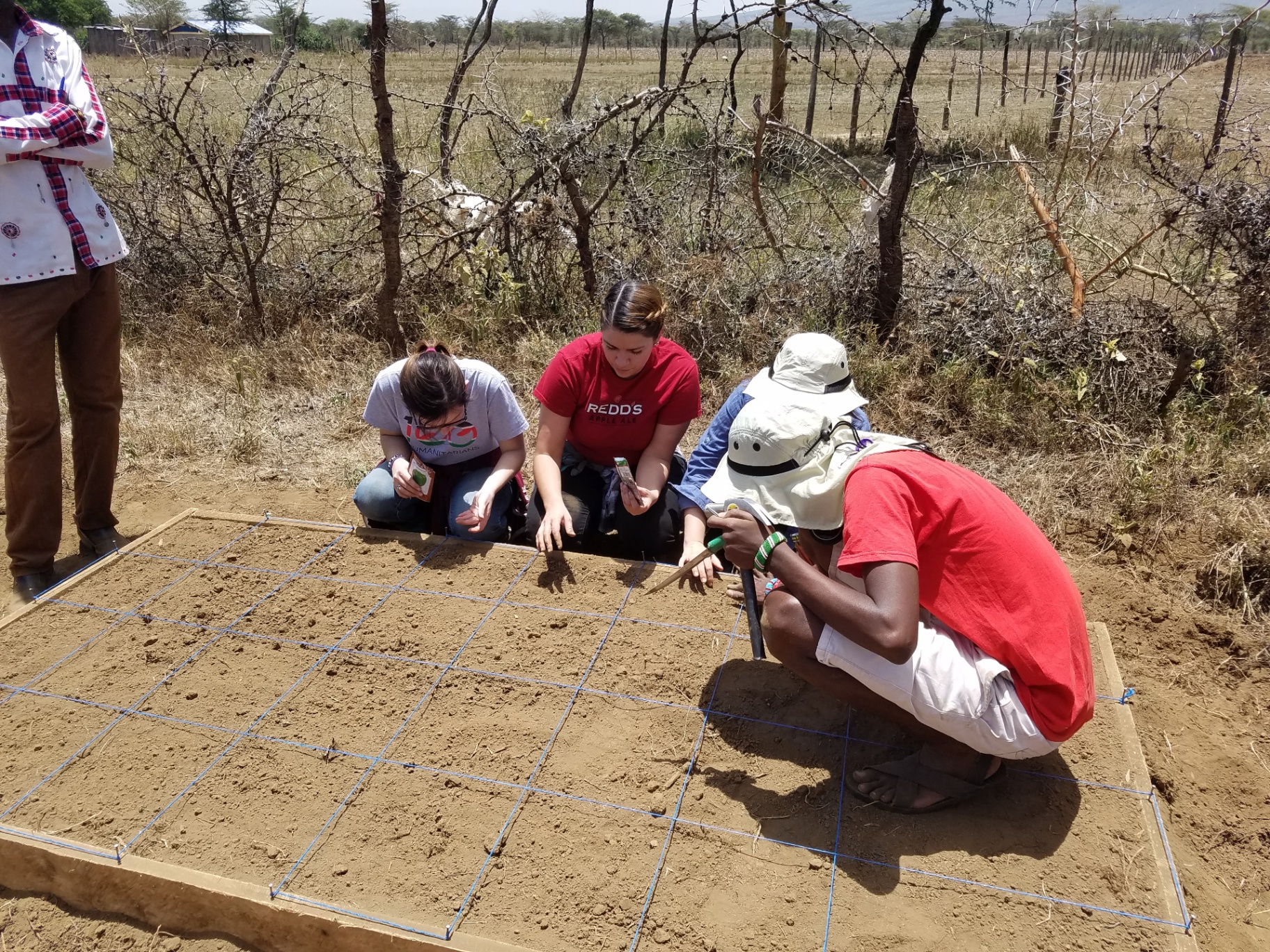 Volunteers planting a Garden Box in Kenya in 2017